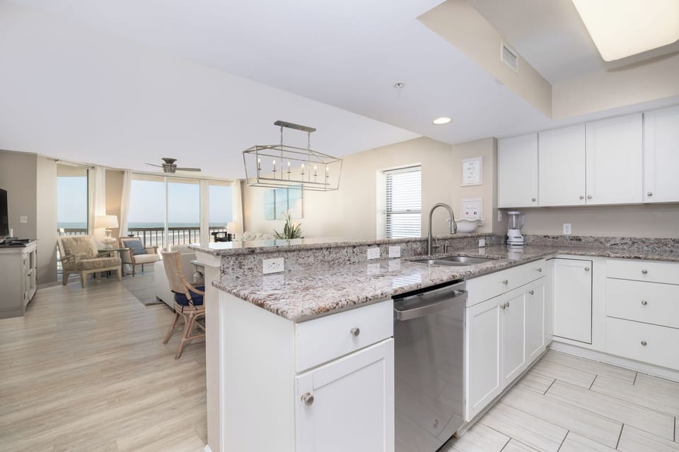 Your spacious open-concept kitchen flows seamlessly into your bright dining area