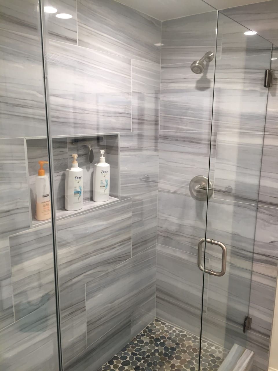 Love this shower!  Shampoo, conditioner and body wash provided