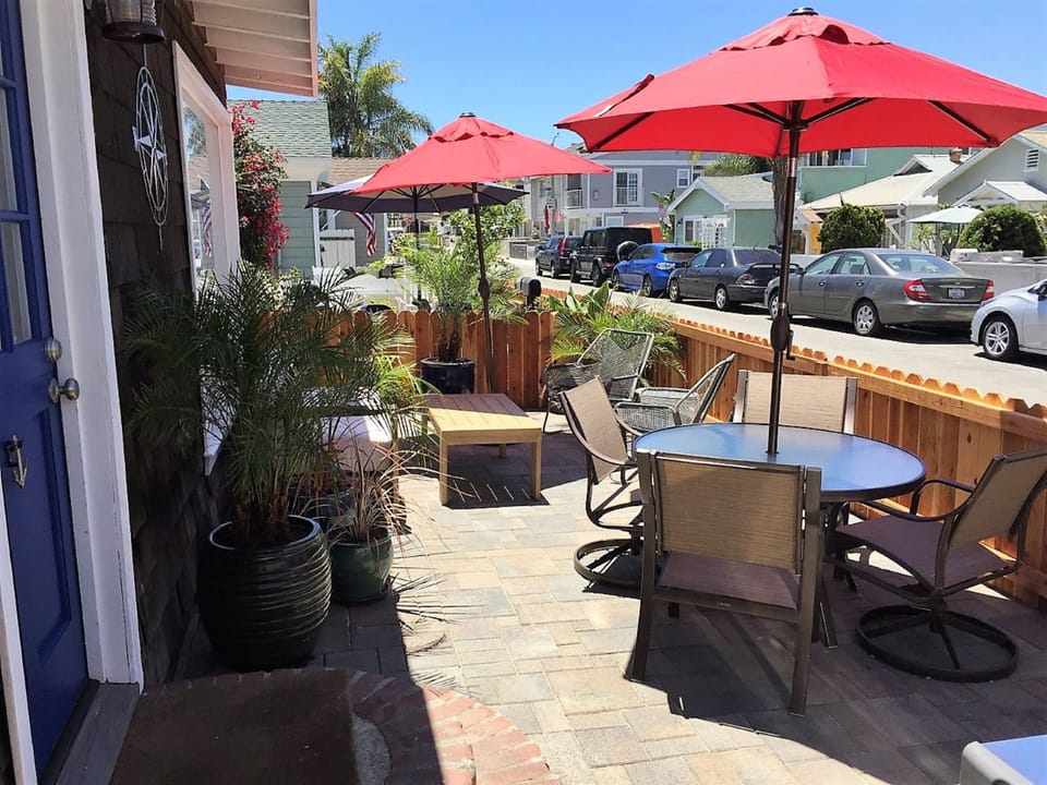 Shared patio includes two seating areas and natural gas BBQ. Patio closes @ 10PM