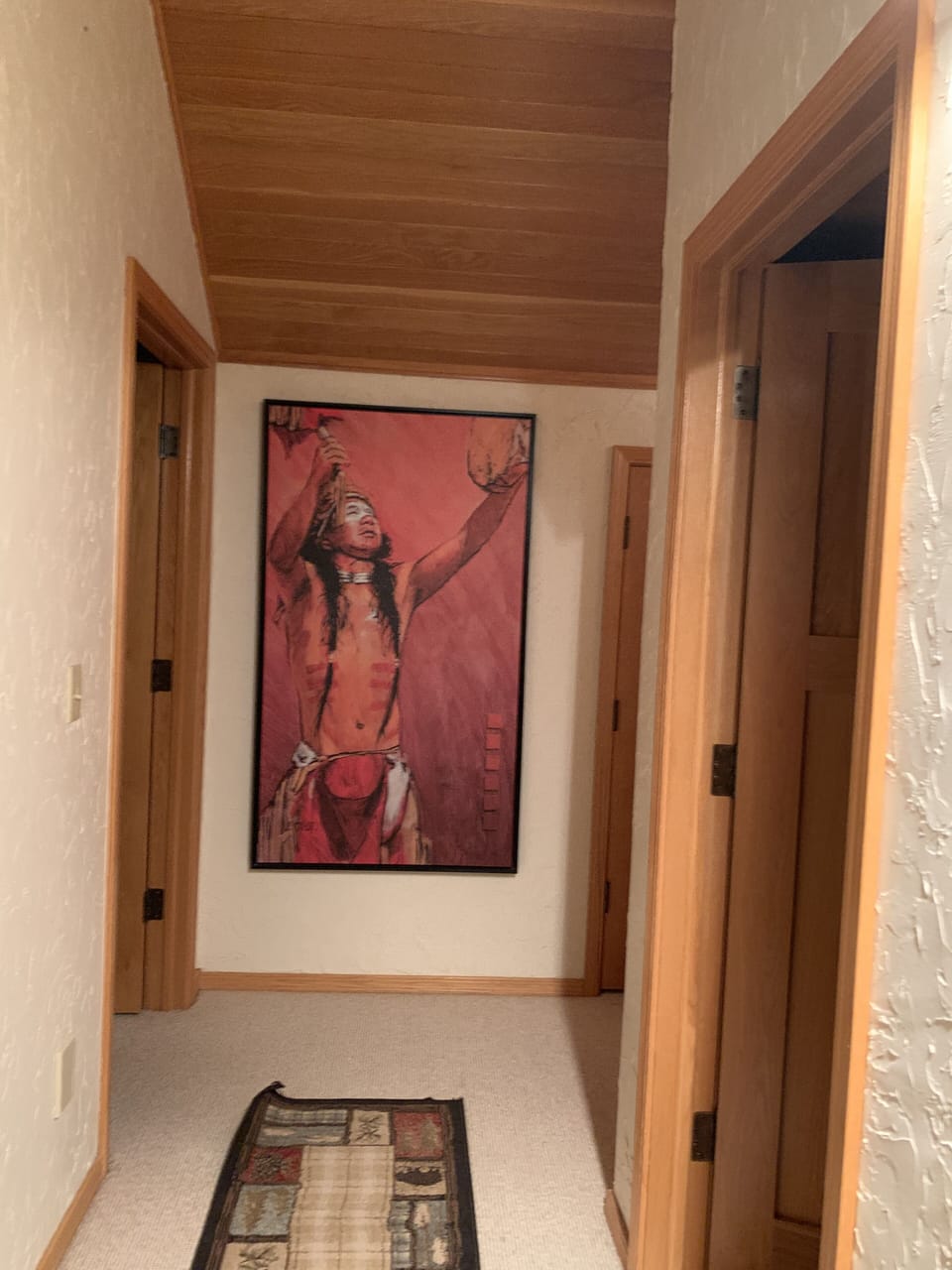 Native American Art throughout. Top floor hallway between 2 bedrooms.Full bath.
