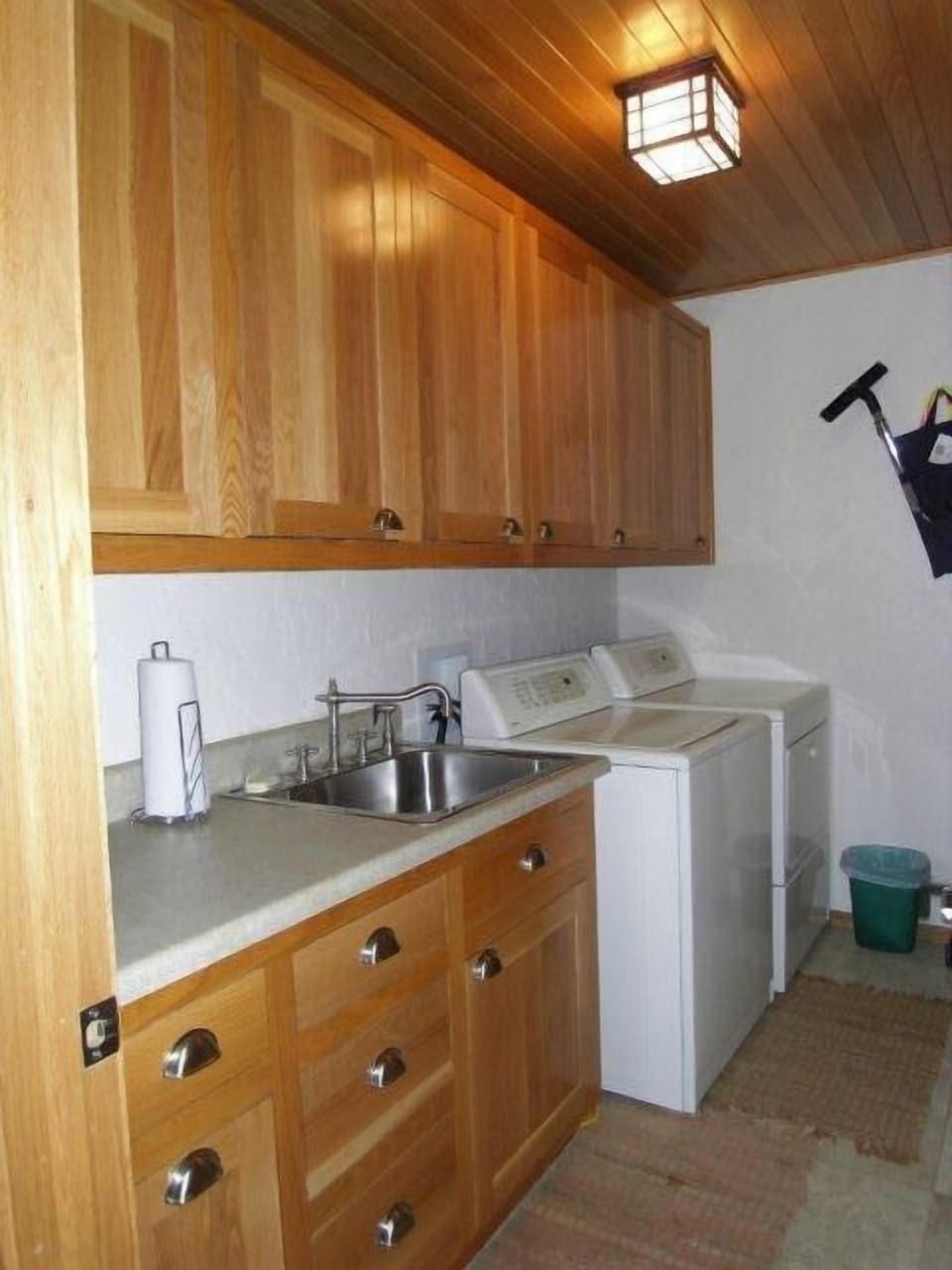 Large washer and dryer in dedicated laundry room.  Detergent provided.