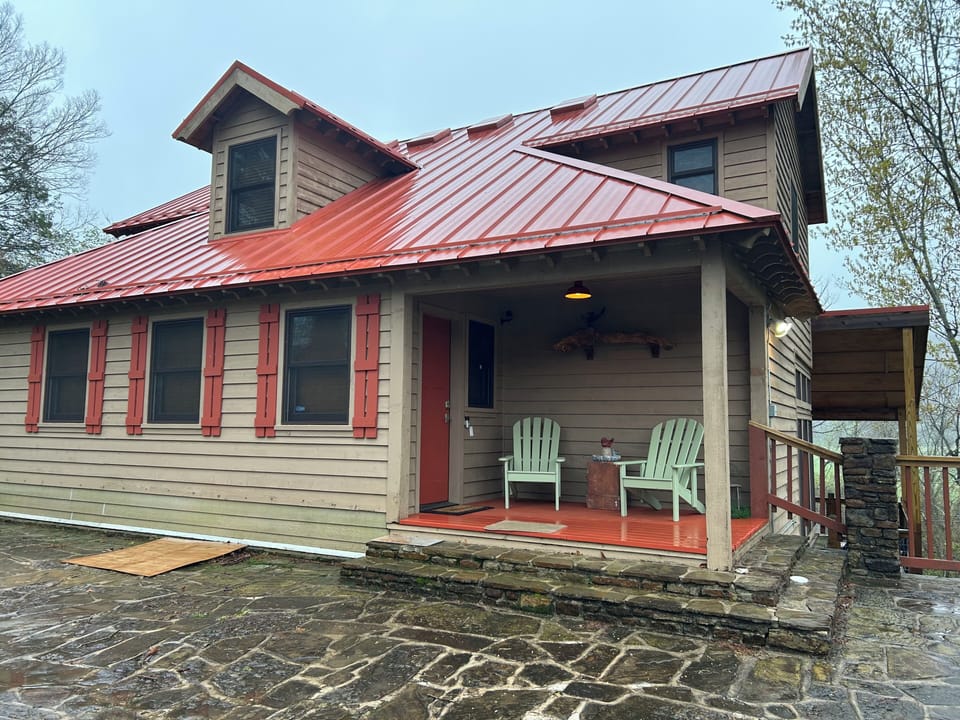 Front of the three-level 4 bathroom modern with wifi river house.