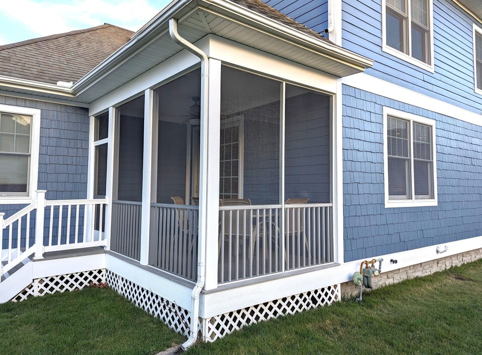 Rear Screen Porch with Table and Chairs