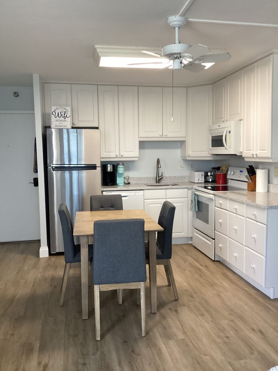 Kitchen with new fridge & countertops & layout