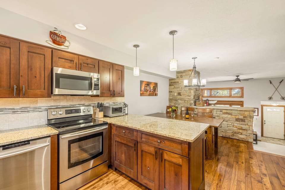 Kitchen has pots, pans, crockpot, utensils, and everything you need to cook.