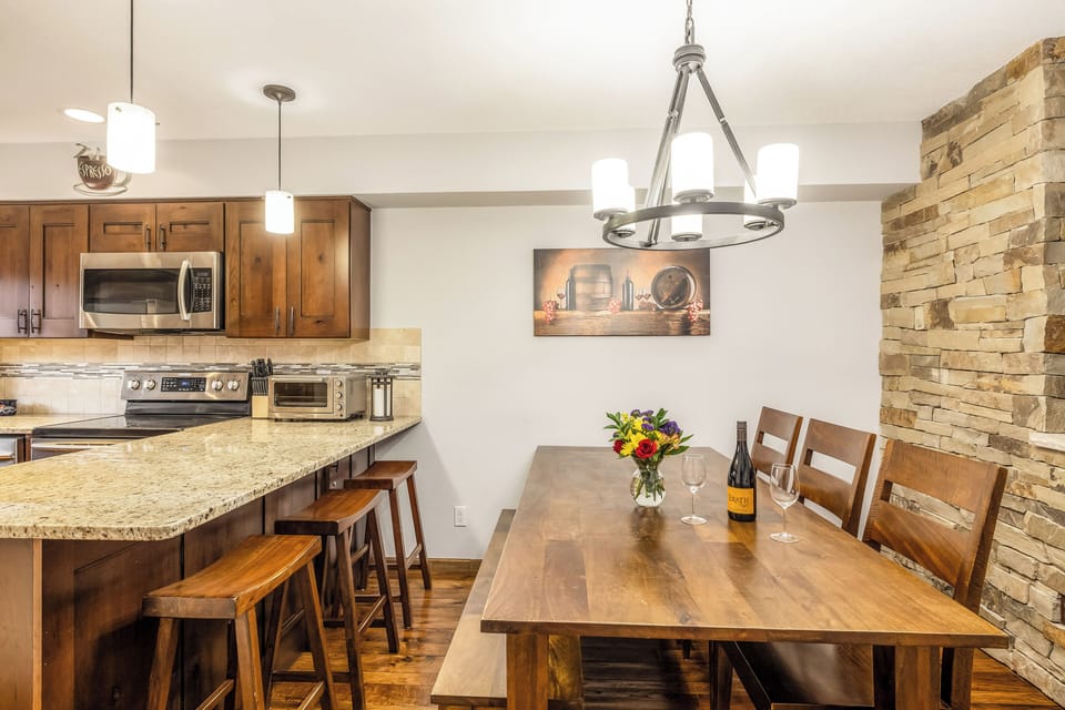 Dining table and breakfast bar seats 9.