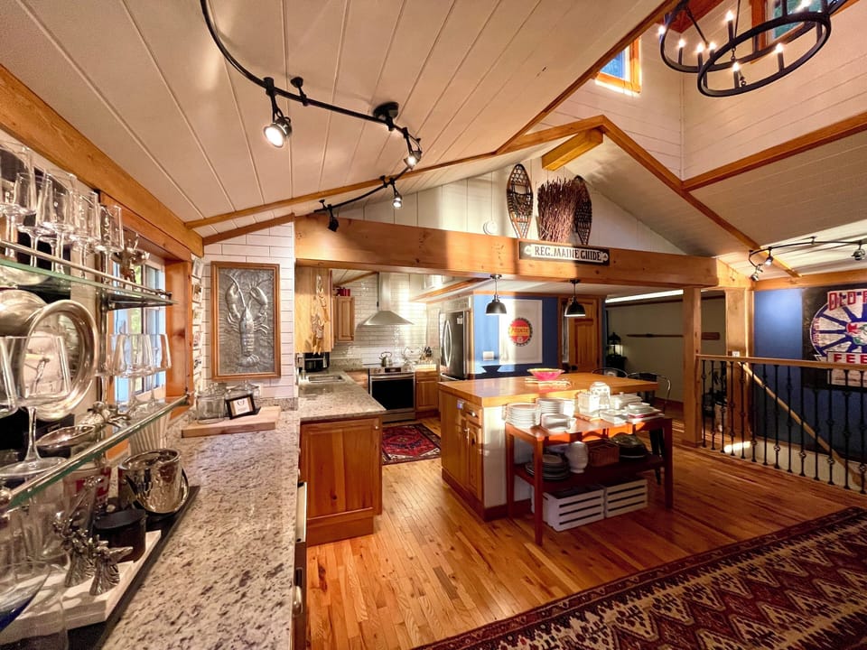 Kitchen, bar and island seating area