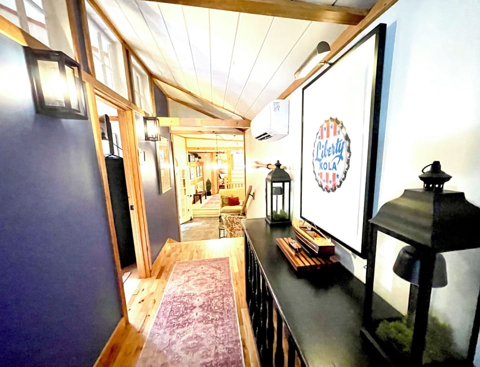 Hall Corridor from Main Entry and Trophy Room. Bedroom #3 off of this hall.