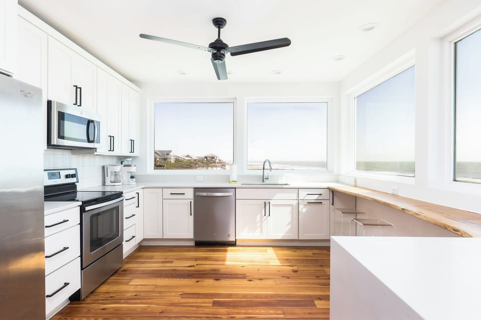 Your stunning, fully-equipped kitchen is filled with natural light