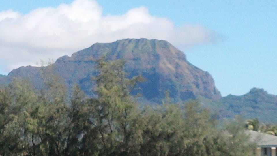 The view of the dormant volcano Haupu from our lanai.