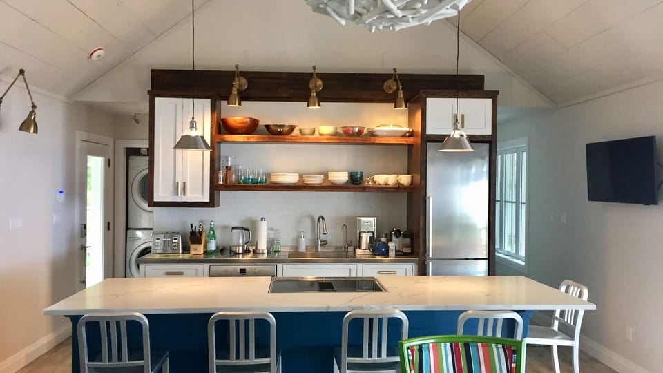 Island dining in this bespoke chefs kitchen.

