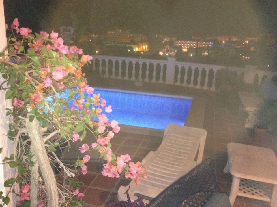 Pool and terrace at night