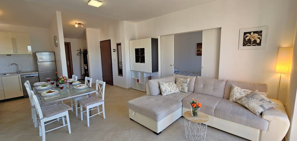 Living room with 2nd bedroom on left , separated by sliding door