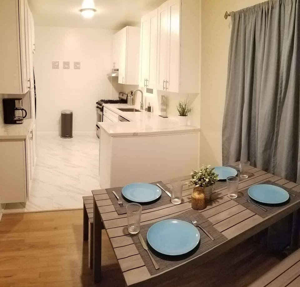 Table seats 4 comfortably. Additional table accommodates another 4 diners.