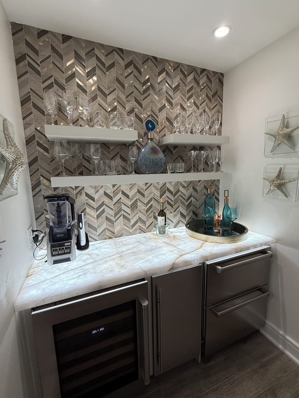 Bar with wine cooler, ice maker and beverage drawers