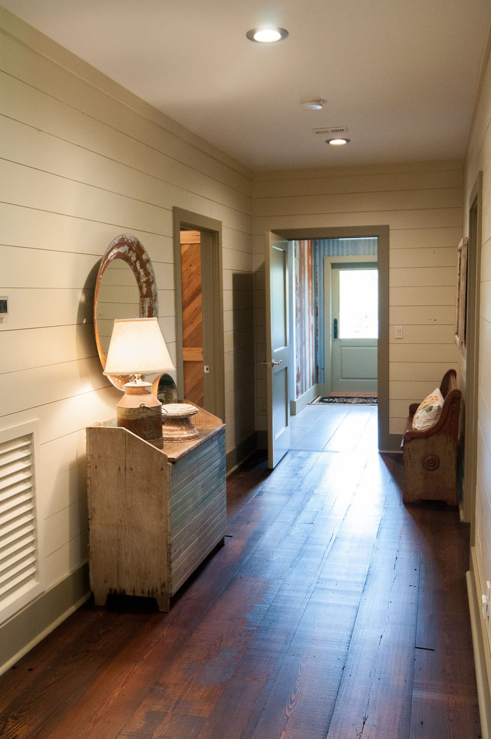 1st floor hallway between bedrooms 1/2 to laundry. 