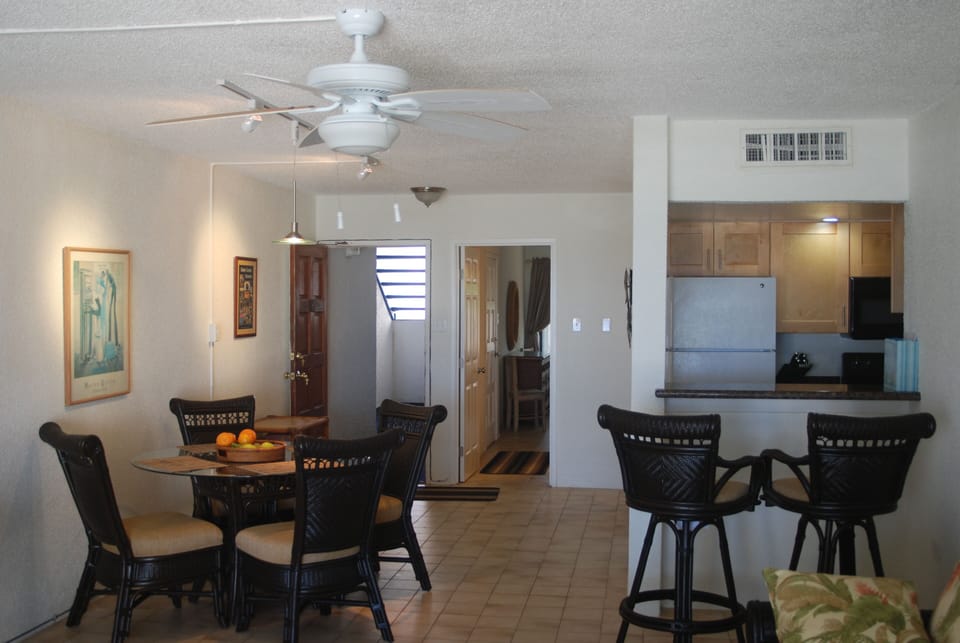 Dining table seats 4. There are 4 other chairs in the condo along with another table, for additional seating.