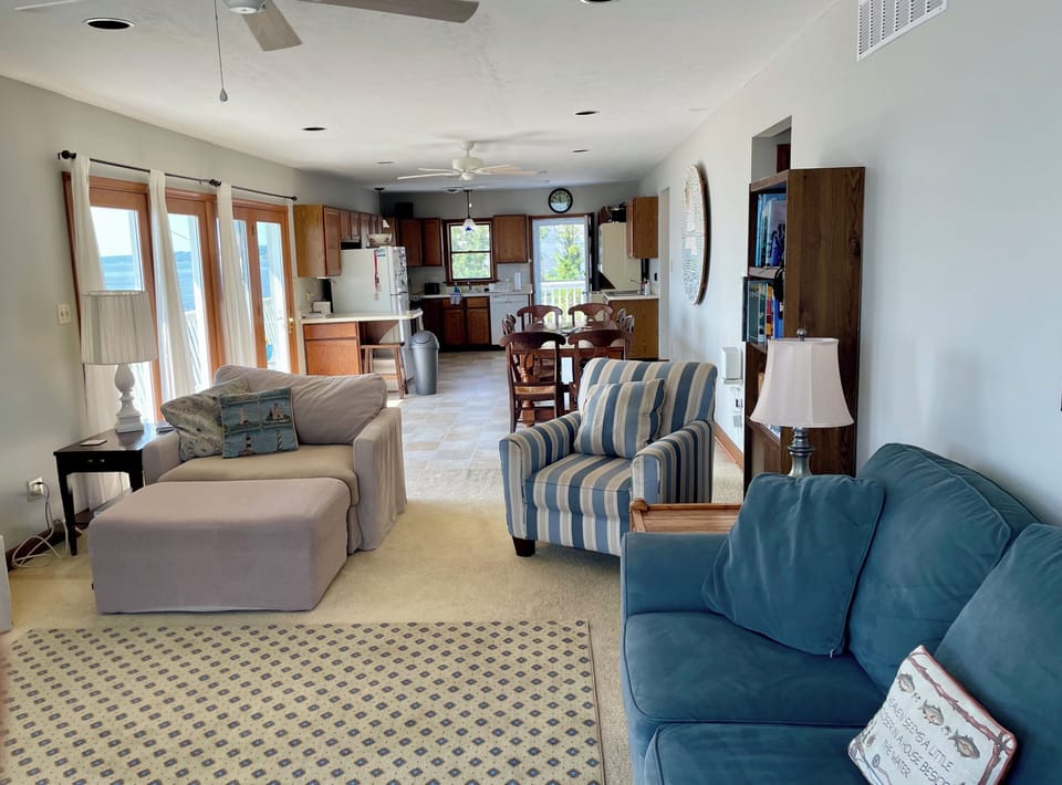 Living room view towards dining and kitchen- open floor plan