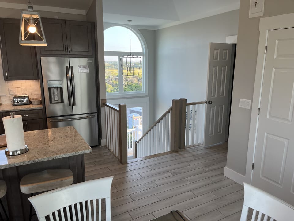 Top floor stairway to other floors and exit.