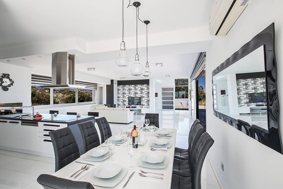 Dining area with table and chairs to seat 8 persons