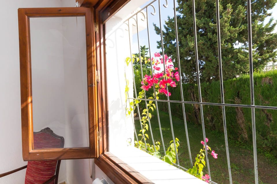 Window in the master bedroom facing the garden 