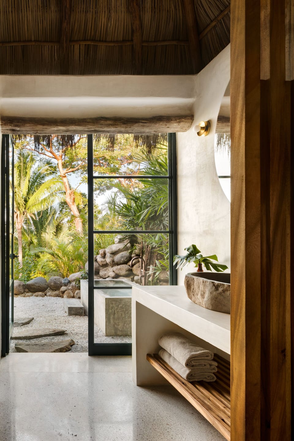 Casita 1 bath suite includes a private outdoor bath with ocean view.