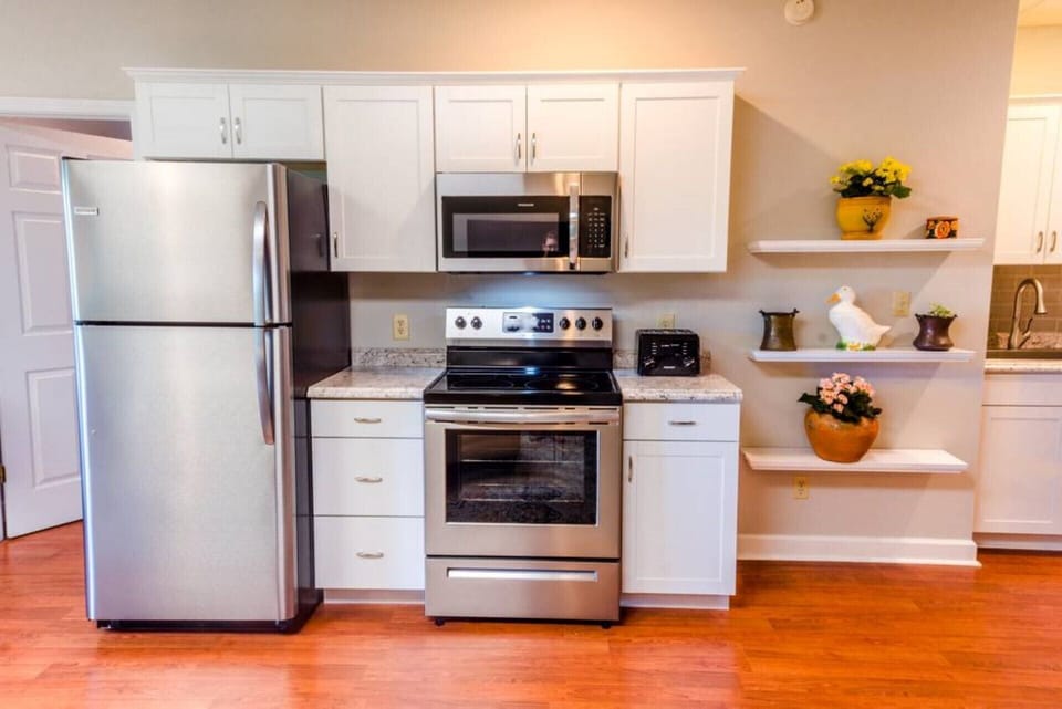 Gourmet kitchen is fully equipped with everything you might need. 