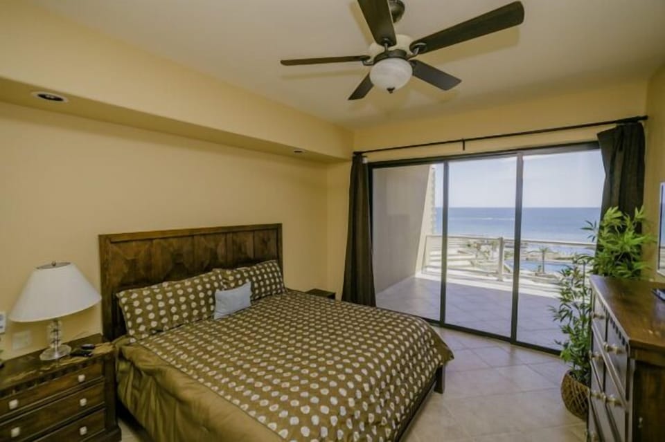 Master bedroom with sliders to the 40' deck, flat screen TV, DVD player 