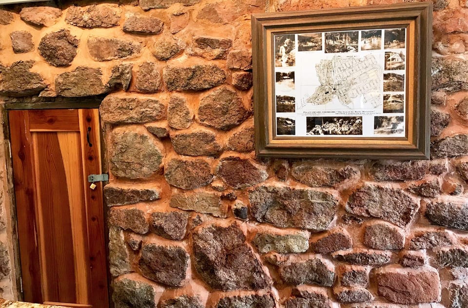 The rock wall was originally an outside wall of the original root cellar.