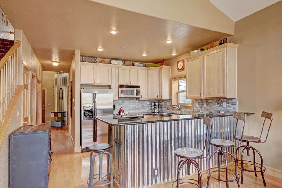 Dramatic Counter Bar separates the Kitchen and Living Room