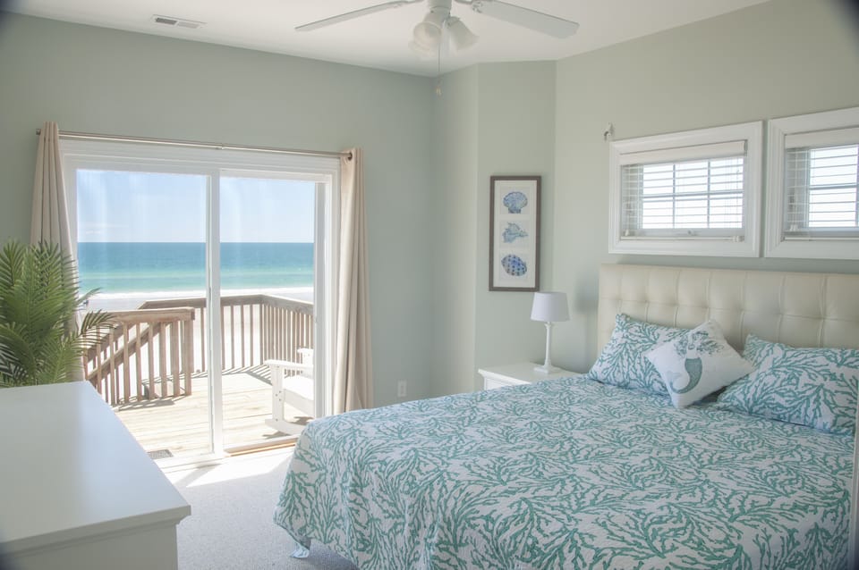 Master Bedroom on Top Floor with King Bed and Padded Leather Headboard.