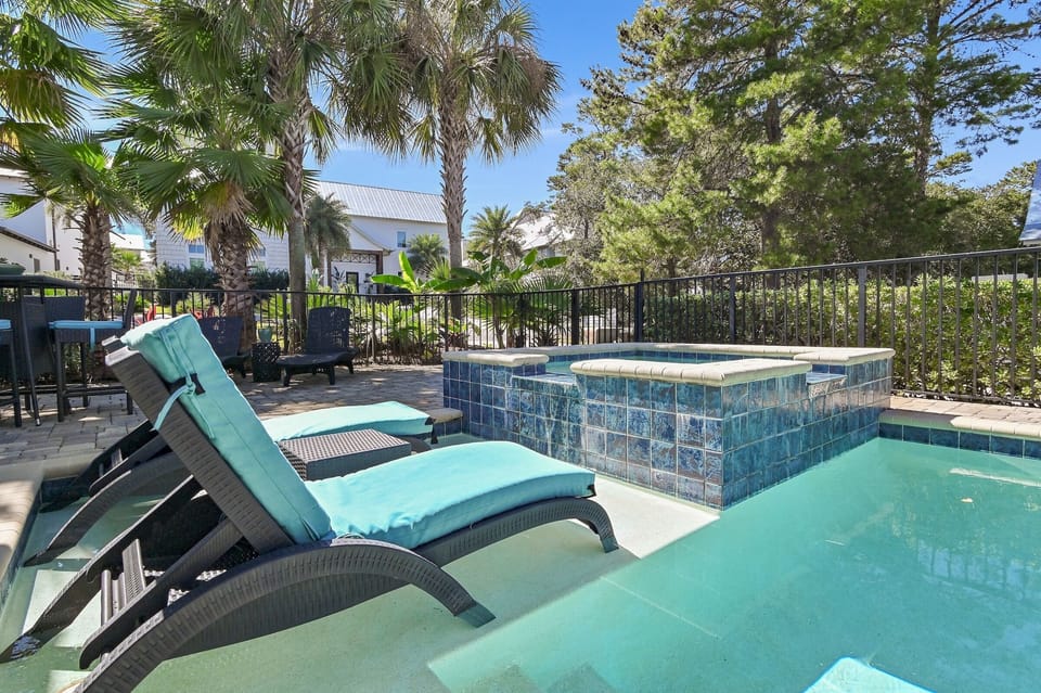 Sunning loungers in the shallow part of pool
