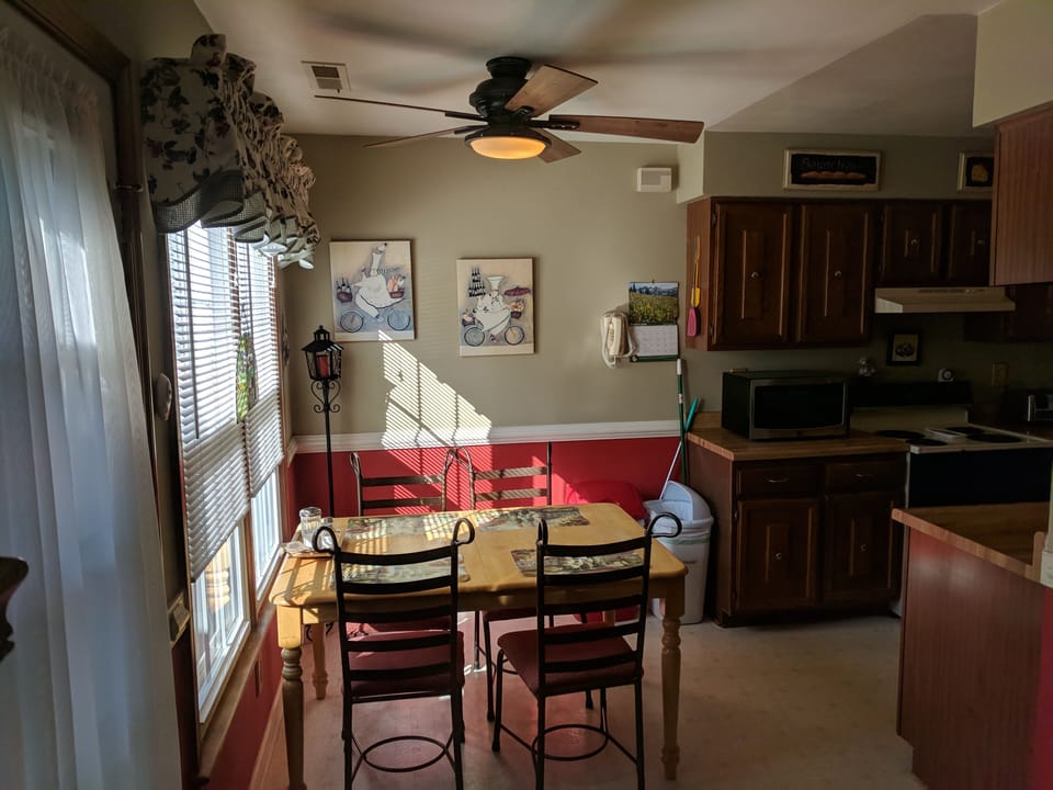Kitchen Breakfast Area and Also Seating at the Kitchen Bar Area and Dining Rm.