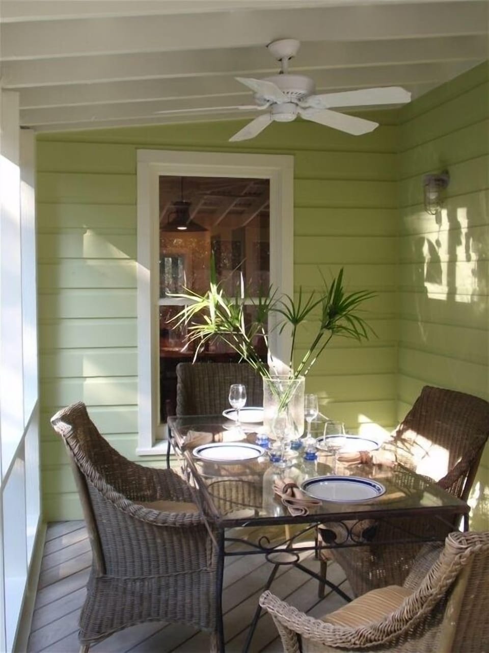 Screened Porch Dining Table, enjoy a meal overlooking the pool