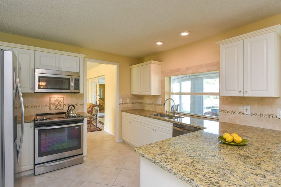 We love the marble back splash and palm mosaic!