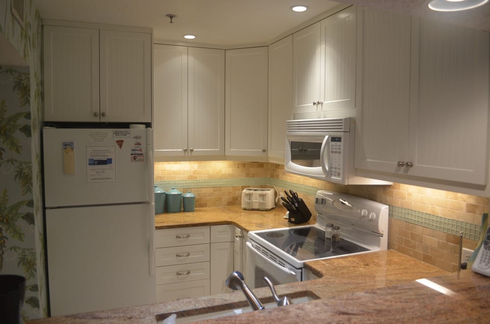 View of Kitchen from counter stools/dining area