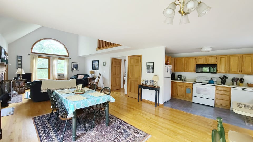 Main living area with dining area, kitchen and living room