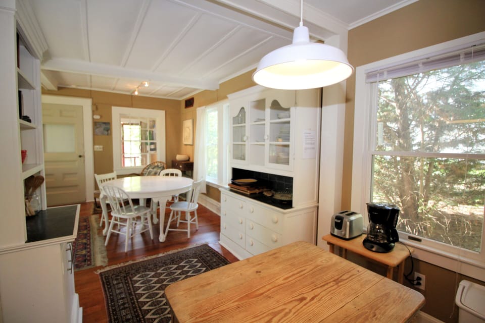 The kitchen has an island for food preparation