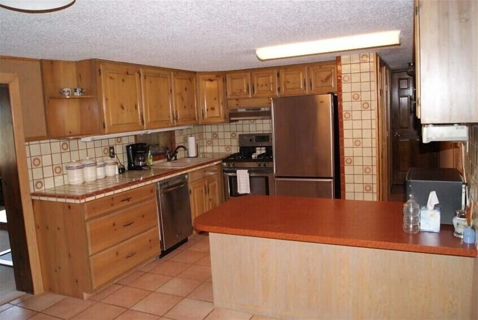 (Kitchen) has some supplies - stove, ref., spices, toaster, & many more things.