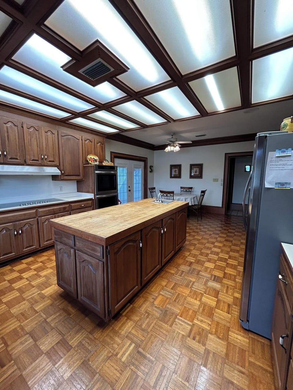 (Full kitchen) Butcher-block kitchen island with bar sink