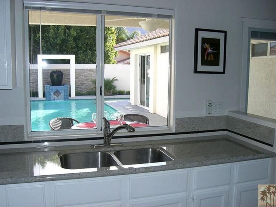 View from kitchen to pool area
