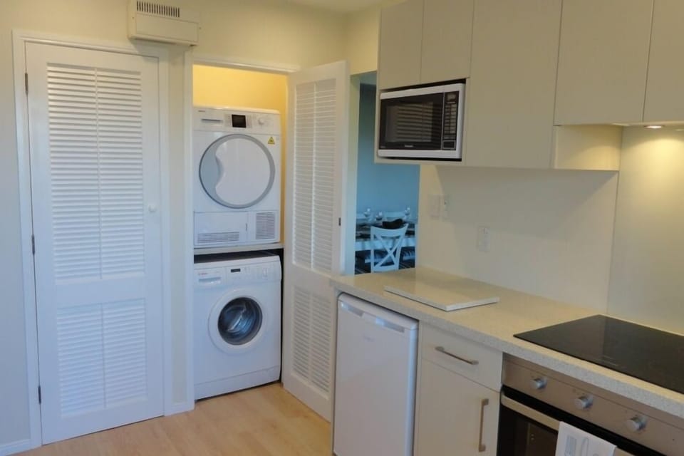 Kitchen including Compact Laundry