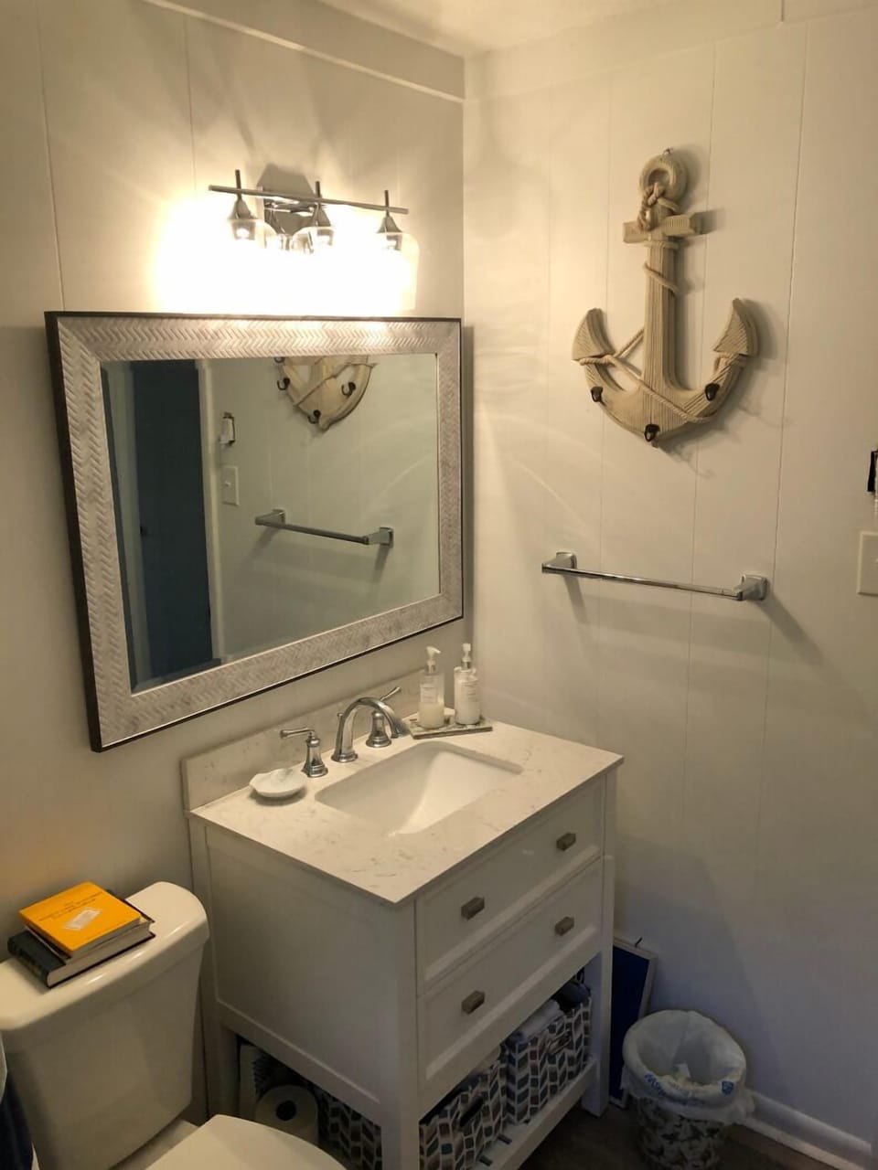 All white beautiful updated bathroom for your small family getaway. 