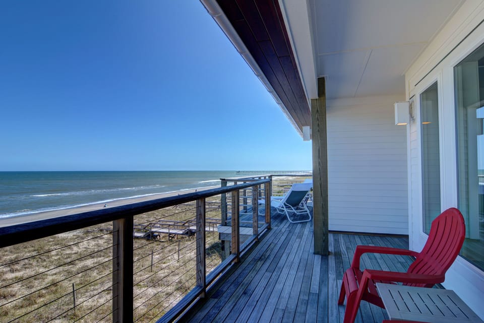 Enormous open view from top floor deck.  You can even see the Kure Beach Pier!