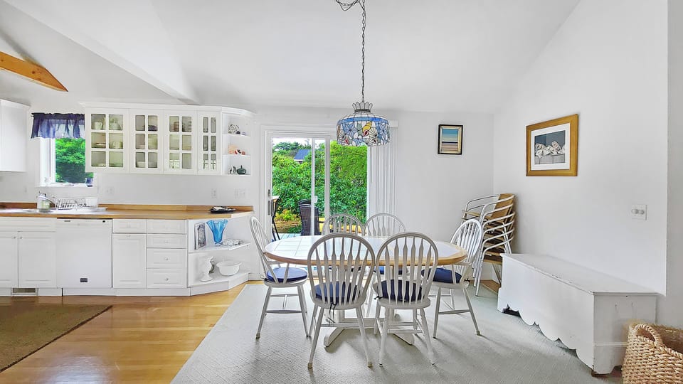 Dining area with slider to back deck