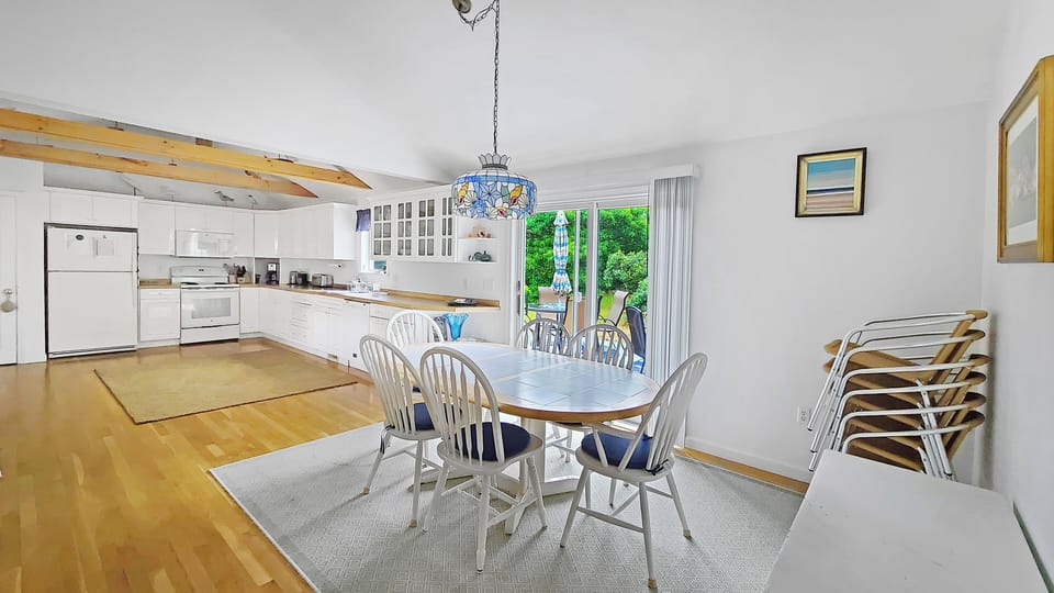 Dining area with slider to back deck