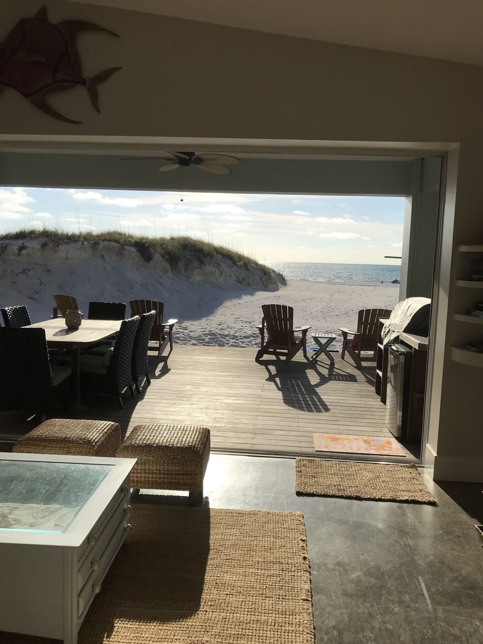 View from the living room.  Sliding doors open letting the outside in.