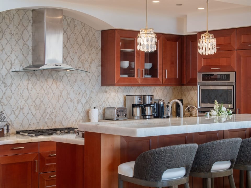 Fully Equipped Gourmet-Style Kitchen with Bar Seating | Solara Luxe Pool...