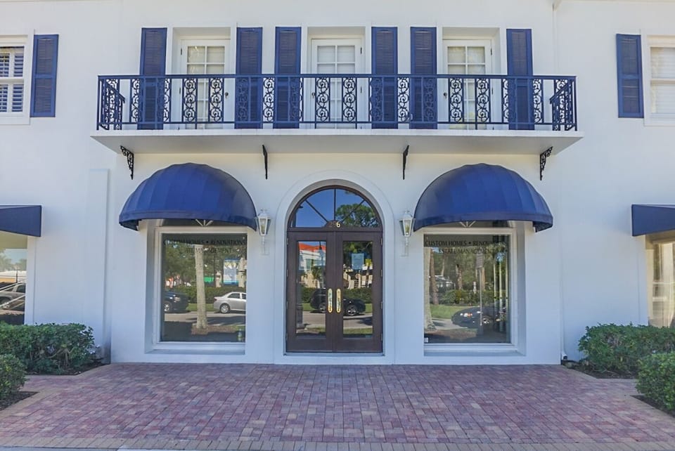 Front of building, condo upstairs. 