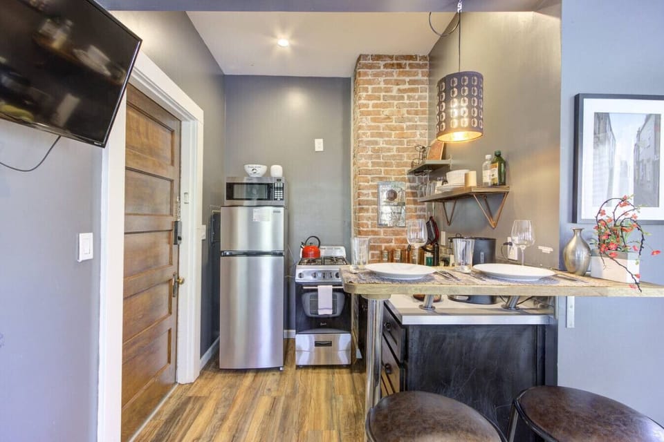 Fully equipped with modern appliances and essentials — from coffee to cooking basics — perfect for a meal in.